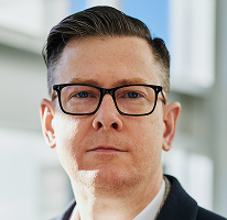 Dyrektor wykonawczy Alexander Hughes – portret CEO przedsiębiorstwa działającego w obszarze handlu kryptowalutami
